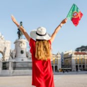 Woman traveling in Lisbon, Portugal - 15 Best Places to Visit in Portugal