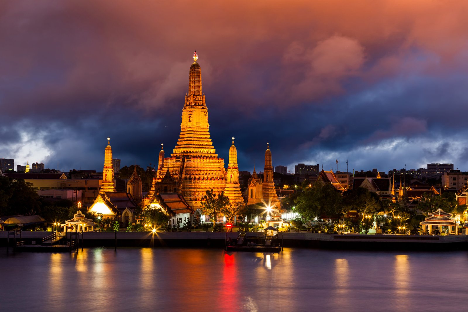 Wat Arun, a Buddhist temple at Chao Phraya riverside in the evening, Bangkok, Thailand.